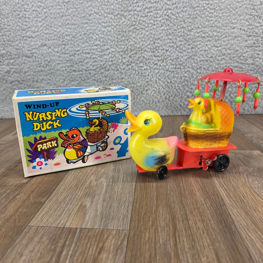 Vintage Wind Up Nursing Duck Toy with Box No. 8001 Hong Kong Spinning Umbrella